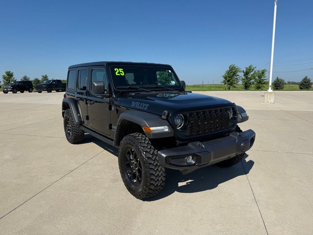 2025 Jeep Wrangler 4xe Willys 4xe in Black Clearcoat — front three-quarter view