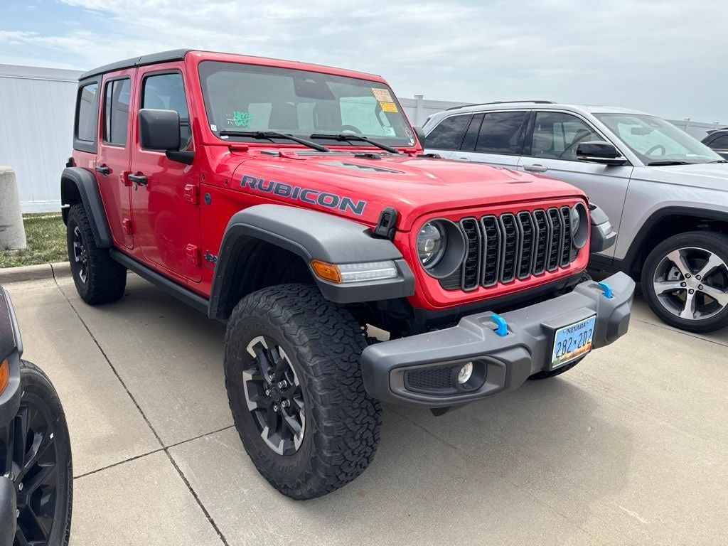 2025 Jeep Wrangler 4xe Rubicon 4xe in Firecracker Red Clearcoat — front three-quarter view