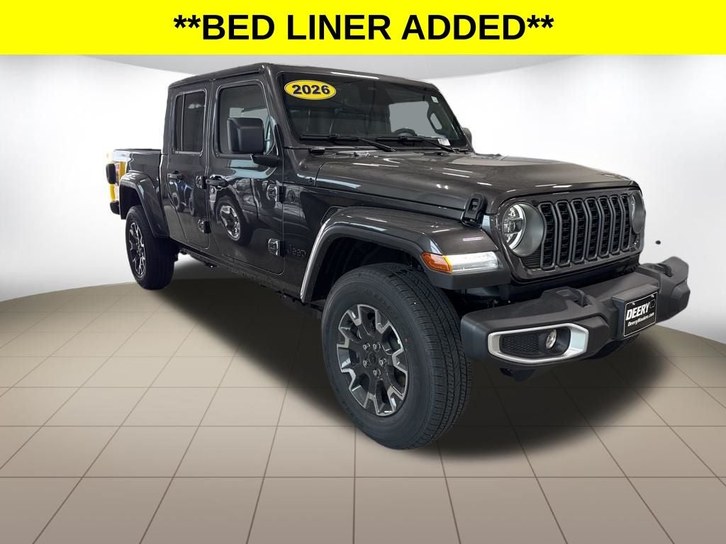 2026 Jeep Gladiator GLADIATOR SAHARA 4X4 in Granite Crystal Metallic Clear-Coat Exterior Paint — front three-quarter view