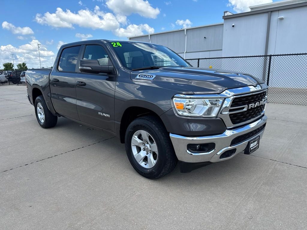 2024 RAM 1500 Big Horn Crew Cab 4x4 5'7' Box in Granite Crystal Metallic Clearcoat — front three-quarter view