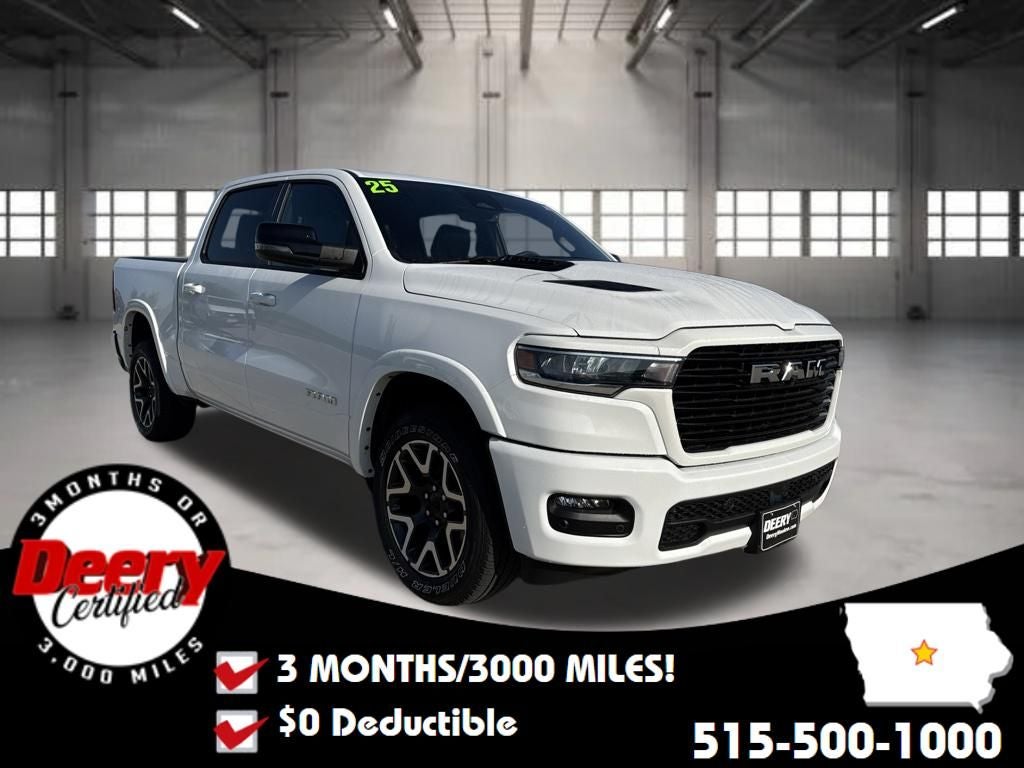 2025 RAM 1500 Laramie Crew Cab 4x4 5'7' Box in Bright White Clearcoat — front three-quarter view