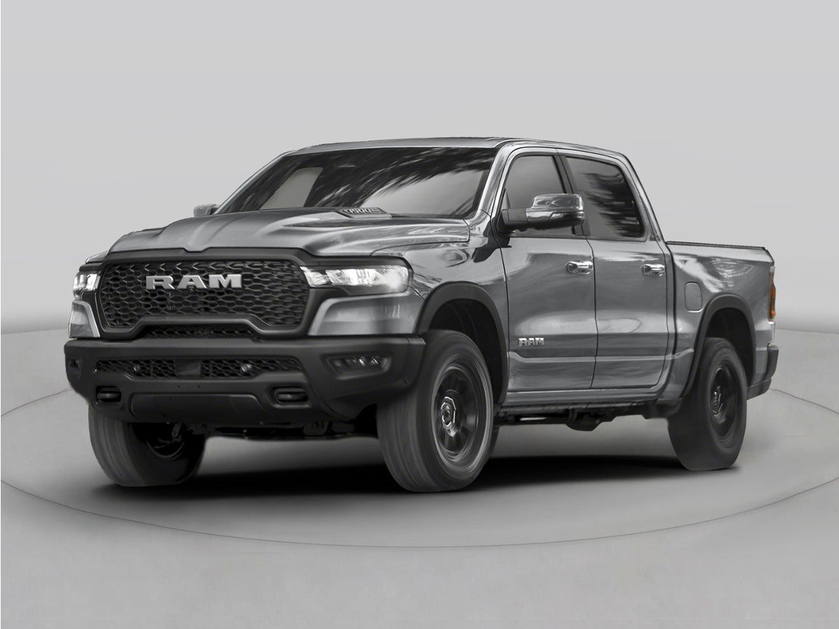 2026 RAM Ram 1500 RAM 1500 TUNGSTEN CREW CAB 4X4 in Bright White Clear-Coat Exterior Paint — front three-quarter view