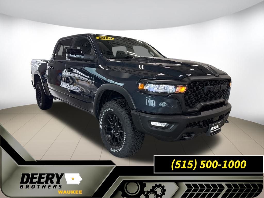 2026 RAM Ram 1500 RAM 1500 REBEL CREW CAB 4X4 5'7' BOX in Forged Blue Metallic Exterior Paint — front three-quarter view