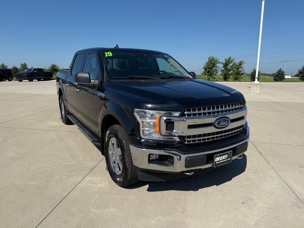 2019 Ford F-150 XLT in Black Metallic — front three-quarter view