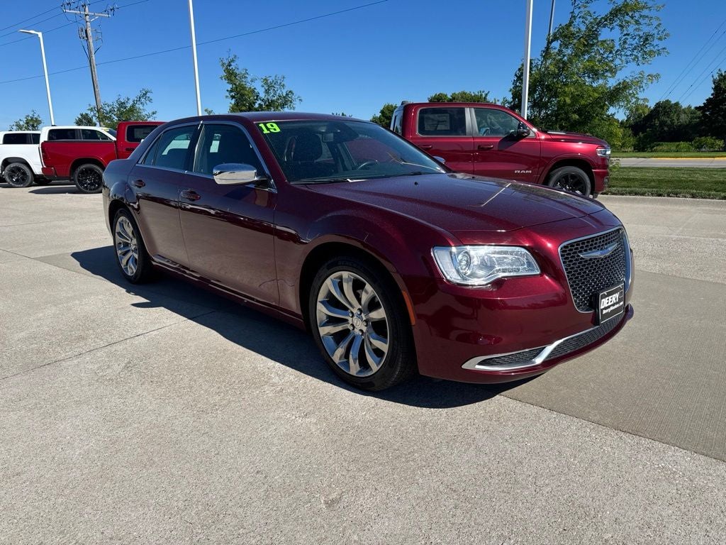 2019 Chrysler 300 Touring in Velvet Red Pearlcoat — front three-quarter view
