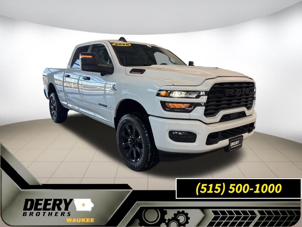 2026 RAM Ram 2500 RAM 2500 BIG HORN CREW CAB 4X4 6'4' BOX in Bright White Clear-Coat Exterior Paint — front three-quarter view