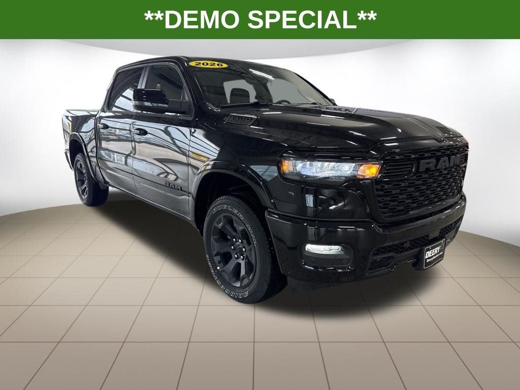 2026 RAM Ram 1500 RAM 1500 BIG HORN CREW CAB 4X4 5'7' BOX in Diamond Black Crystal Pearl-Coat Exterior Paint — front three-quarter view