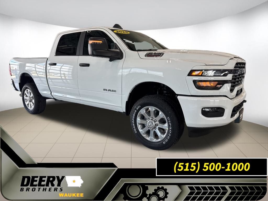 2026 RAM Ram 2500 RAM 2500 BIG HORN CREW CAB 4X4 6'4' BOX in Bright White Clear-Coat Exterior Paint — front three-quarter view