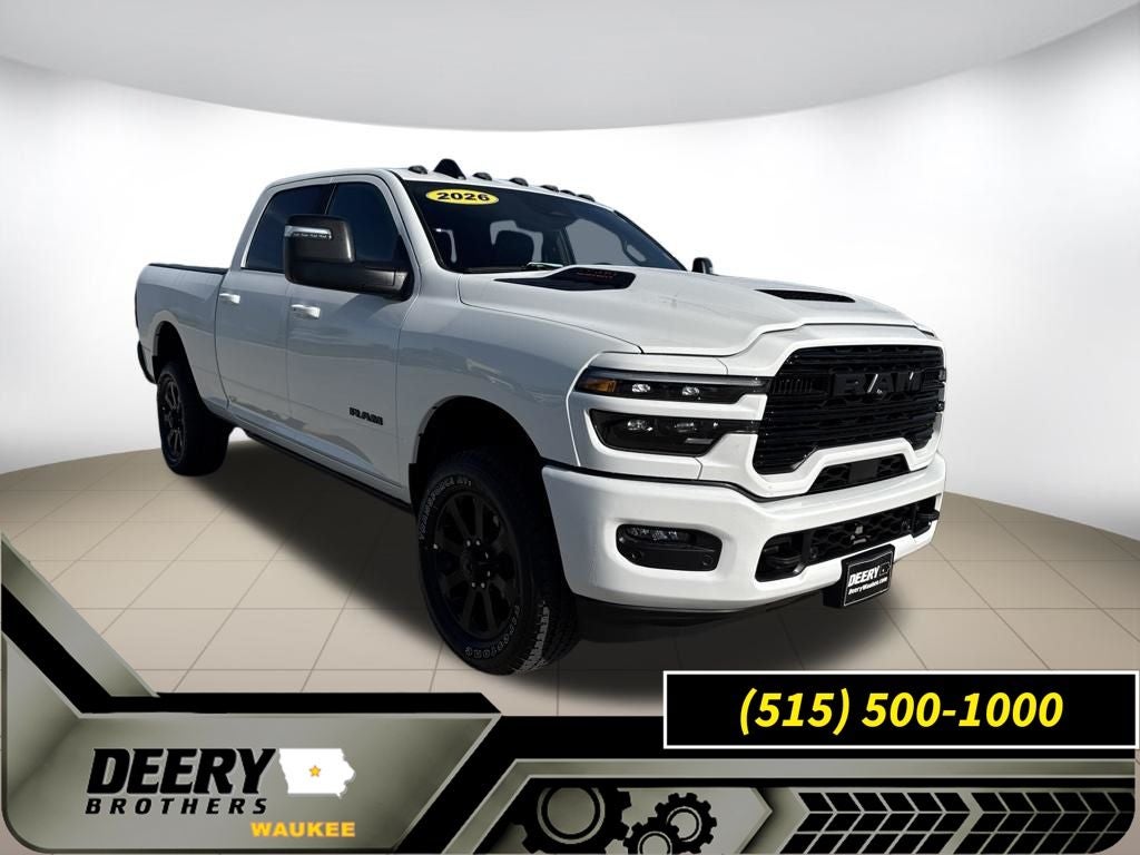 2026 RAM Ram 2500 RAM 2500 LARAMIE CREW CAB 4X4 6'4' BOX in Bright White Clear-Coat Exterior Paint — front three-quarter view