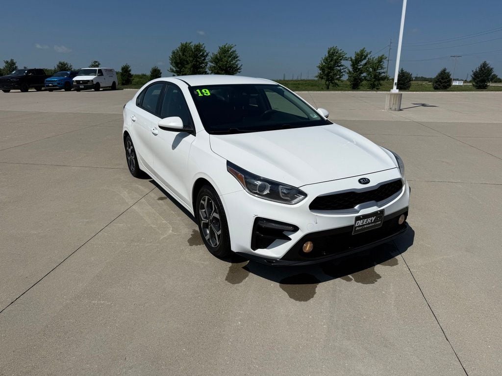 2019 Kia Forte LXS in Clear White — front three-quarter view